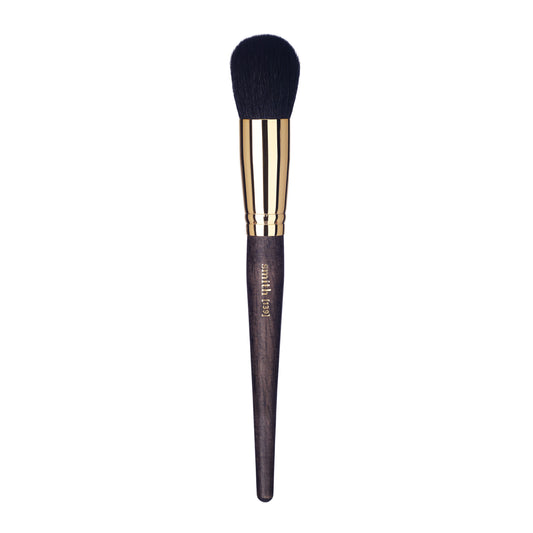 Front view of a buffing face and body makeup brush with a gold ferrule and dark wood handle, labeled with the brand name “Smith” and the brush number “139”